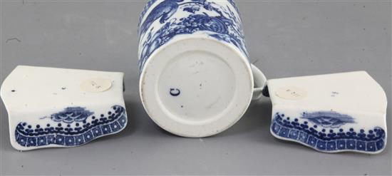 A Caughley parrot and fruit pattern small mug and a pair of Caughley asparagus servers